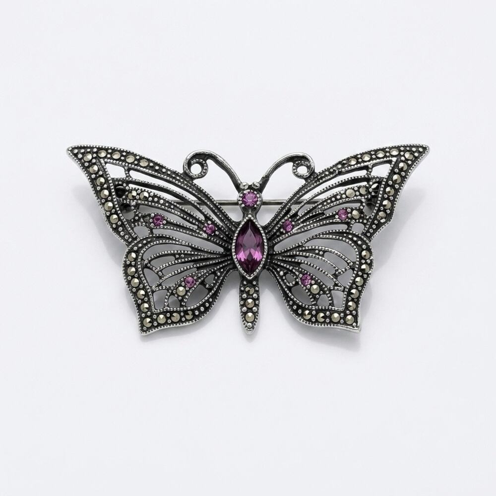 Vintage 1980s Silver tone butterfly brooch, LIA purple rhinestones marcasite